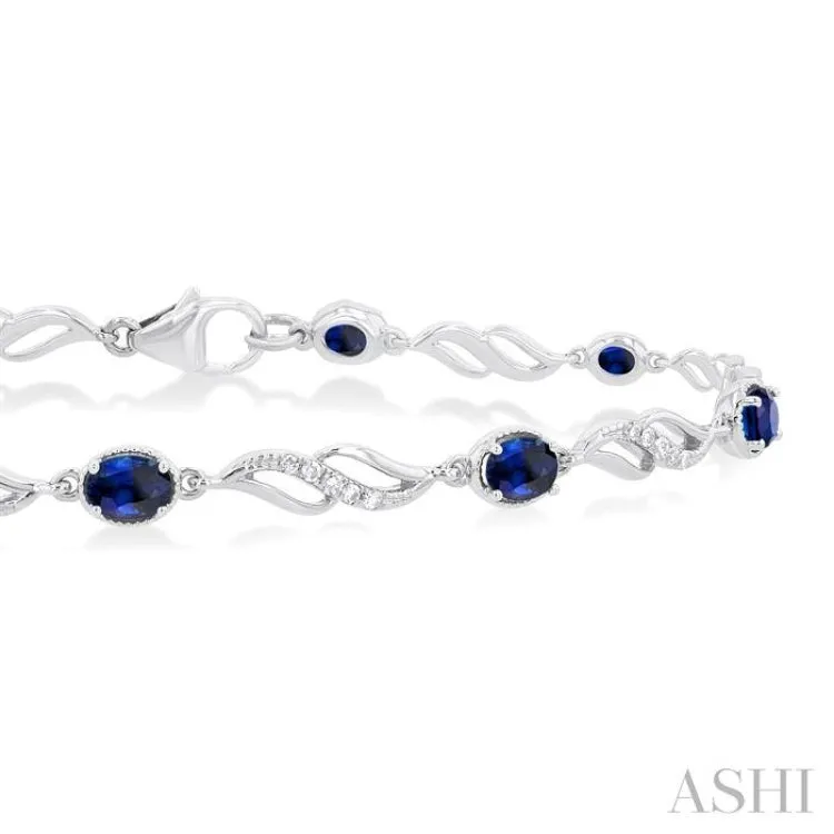 1/5 Ctw Oval Cut 4X3 MM Sapphire and Round Cut Diamond Precious Eternity Link Tennis Bracelet in 10K White Gold