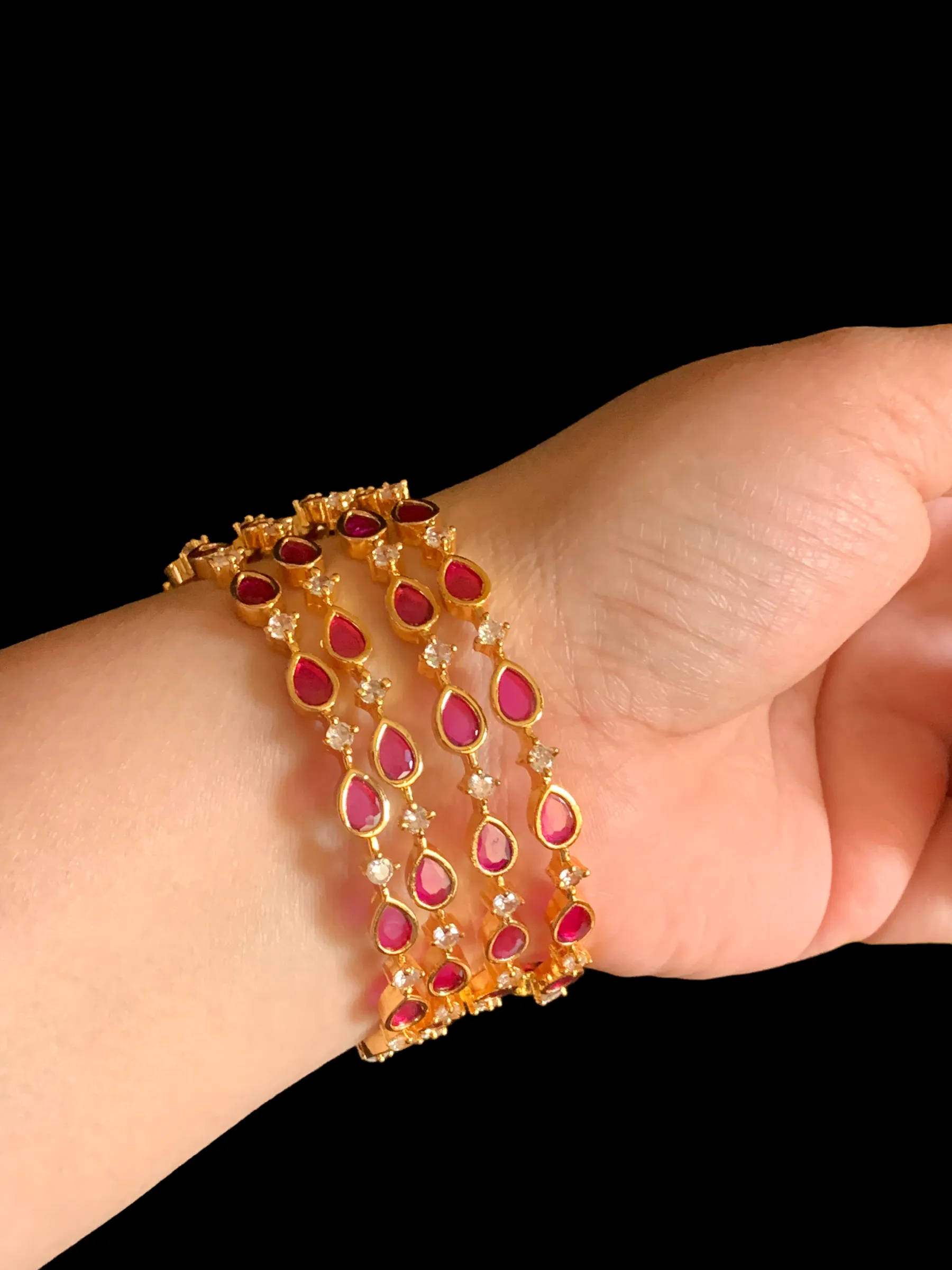 B122 cz bangles - set of 4  - Ruby ( SHIPS IN 4 WEEKS  )