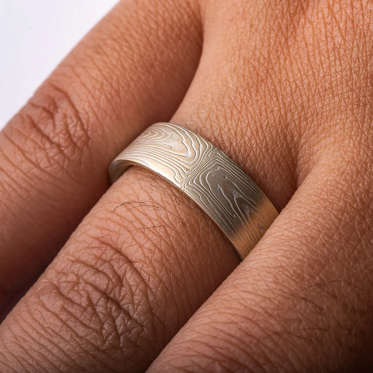 Subtle Wedding Band in Vortex Pattern and Spark Palette